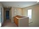 Upstairs hallway with built-in storage and carpet at 5066 El Castano Ave, Las Vegas, NV 89108