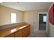 Upstairs hallway with built-in storage and access to bedrooms at 5066 El Castano Ave, Las Vegas, NV 89108