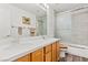 Bathroom boasts double vanity and tiled shower at 5112 Palm View Dr, Las Vegas, NV 89130