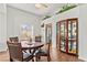 Charming dining room with round table and four chairs, near kitchen at 5112 Palm View Dr, Las Vegas, NV 89130