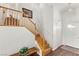 Light and bright entryway with staircase and wood flooring at 5112 Palm View Dr, Las Vegas, NV 89130