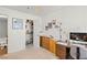 Home office with wood desk, closet, and window at 5112 Palm View Dr, Las Vegas, NV 89130