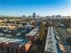 Aerial view of apartment complex with parking and cityscape in background at 5160 Indian River Dr # 329, Las Vegas, NV 89103