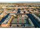 Aerial view of apartment complex with tennis courts and swimming pool at 5160 Indian River Dr # 329, Las Vegas, NV 89103