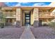 Exterior view of a two-story building with stone accents and balconies at 5160 Indian River Dr # 329, Las Vegas, NV 89103