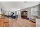 Dining room with a large wooden table and hardwood floors at 6104 Talbot Springs Ct, North Las Vegas, NV 89081