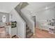 Bright and airy entryway with staircase, hardwood floors, and a fish tank at 6104 Talbot Springs Ct, North Las Vegas, NV 89081