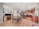 Modern kitchen featuring granite countertops and ample cabinetry at 6104 Talbot Springs Ct, North Las Vegas, NV 89081