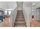 Elegant staircase leading to the upper level of the home at 6104 Talbot Springs Ct, North Las Vegas, NV 89081