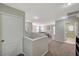 Upstairs hallway with access to bedrooms and laundry room at 6104 Talbot Springs Ct, North Las Vegas, NV 89081