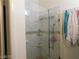 Bathroom with glass shower and marble tile at 6201 E Lake Mead Blvd # 218, Las Vegas, NV 89156