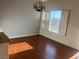 Dining room with hardwood floors and large window at 6201 E Lake Mead Blvd # 218, Las Vegas, NV 89156