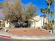 Single-story house with a landscaped front yard and corner lot at 6256 Hill Haven Ave, Las Vegas, NV 89130