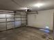 Spacious garage with overhead door and ample storage space at 6256 Hill Haven Ave, Las Vegas, NV 89130