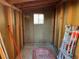 Unfinished storage shed with window and room for tools at 6256 Hill Haven Ave, Las Vegas, NV 89130