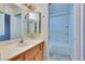 Clean bathroom with a vanity, medicine cabinet, and bathtub at 6617 Old Newbury Ave, Las Vegas, NV 89108