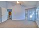 Light blue walls and carpeted floors in this bright bedroom at 6617 Old Newbury Ave, Las Vegas, NV 89108