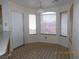 Bright dining area with bay window and tile flooring at 6617 Old Newbury Ave, Las Vegas, NV 89108