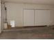 Garage with storage cabinets and water heater at 6617 Old Newbury Ave, Las Vegas, NV 89108