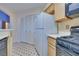 Kitchen with white refrigerator and light wood cabinets at 6617 Old Newbury Ave, Las Vegas, NV 89108