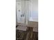 Modern bathroom featuring a glass-enclosed shower and a separate soaking tub at 7050 Fossil Rim St, Las Vegas, NV 89084