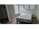Bright bedroom with three windows and neutral carpet at 7050 Fossil Rim St, Las Vegas, NV 89084