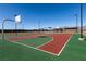 Dual basketball court with green and red surfaces at 7122 Rocket Launch St, North Las Vegas, NV 89084