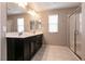 Bathroom with double vanity and shower at 7122 Rocket Launch St, North Las Vegas, NV 89084