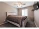 Bedroom with queen-size bed and ceiling fan at 7122 Rocket Launch St, North Las Vegas, NV 89084