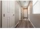 Interior hallway with gray walls and wood-look flooring at 7122 Rocket Launch St, North Las Vegas, NV 89084