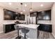 Modern kitchen with stainless steel appliances and an island at 7122 Rocket Launch St, North Las Vegas, NV 89084