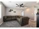 Loft area with sectional sofa and ceiling fan at 7122 Rocket Launch St, North Las Vegas, NV 89084