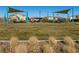 Modern playground with shade structures and play equipment at 7122 Rocket Launch St, North Las Vegas, NV 89084