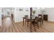 Elegant dining room featuring hardwood floors and a chandelier at 7307 Iron Oak Ave, Las Vegas, NV 89113