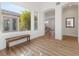 Bright entryway with hardwood floors and large windows at 7307 Iron Oak Ave, Las Vegas, NV 89113