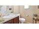 Clean bathroom with single sink vanity, toilet and flooring at 8157 Amy Springs St, Las Vegas, NV 89113