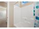 Clean bathroom with tub shower combo and polka dot curtain at 8157 Amy Springs St, Las Vegas, NV 89113