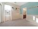 Bedroom with light blue and beige walls, carpeted floor at 8157 Amy Springs St, Las Vegas, NV 89113