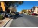 Residential street with parked cars and two-story houses at 8157 Amy Springs St, Las Vegas, NV 89113