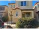 Two-story house with green door and landscaping at 8157 Amy Springs St, Las Vegas, NV 89113