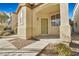 House entrance with green door and small covered porch at 8157 Amy Springs St, Las Vegas, NV 89113