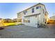 Two story house with a gravel backyard and stepping stones at 8224 Skye Territory St, Las Vegas, NV 89166