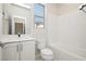 Bathroom with white vanity, toilet and bathtub at 8224 Skye Territory St, Las Vegas, NV 89166