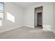 Bedroom with carpet, window, and walk-in closet at 8224 Skye Territory St, Las Vegas, NV 89166