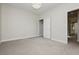 Bedroom with carpet, chandelier, and walk-in closet at 8224 Skye Territory St, Las Vegas, NV 89166