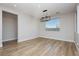 Formal dining room with hardwood floors and a modern chandelier at 8224 Skye Territory St, Las Vegas, NV 89166