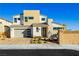 Two-story modern home with attached garage and landscaped front yard at 8224 Skye Territory St, Las Vegas, NV 89166