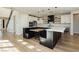 Modern kitchen with a large island and breakfast bar at 8224 Skye Territory St, Las Vegas, NV 89166