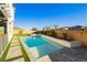 Luxury pool and spa with grassy backyard at 8224 Skye Territory St, Las Vegas, NV 89166