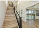 Modern staircase with metal railing leading to upper level at 8224 Skye Territory St, Las Vegas, NV 89166